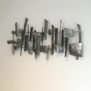Grey wall mounted art piece by Brian Fell called Barcode