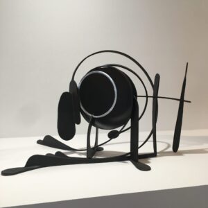 Photograph of black steel abstract statue part of Steelworks by Brian Fell.